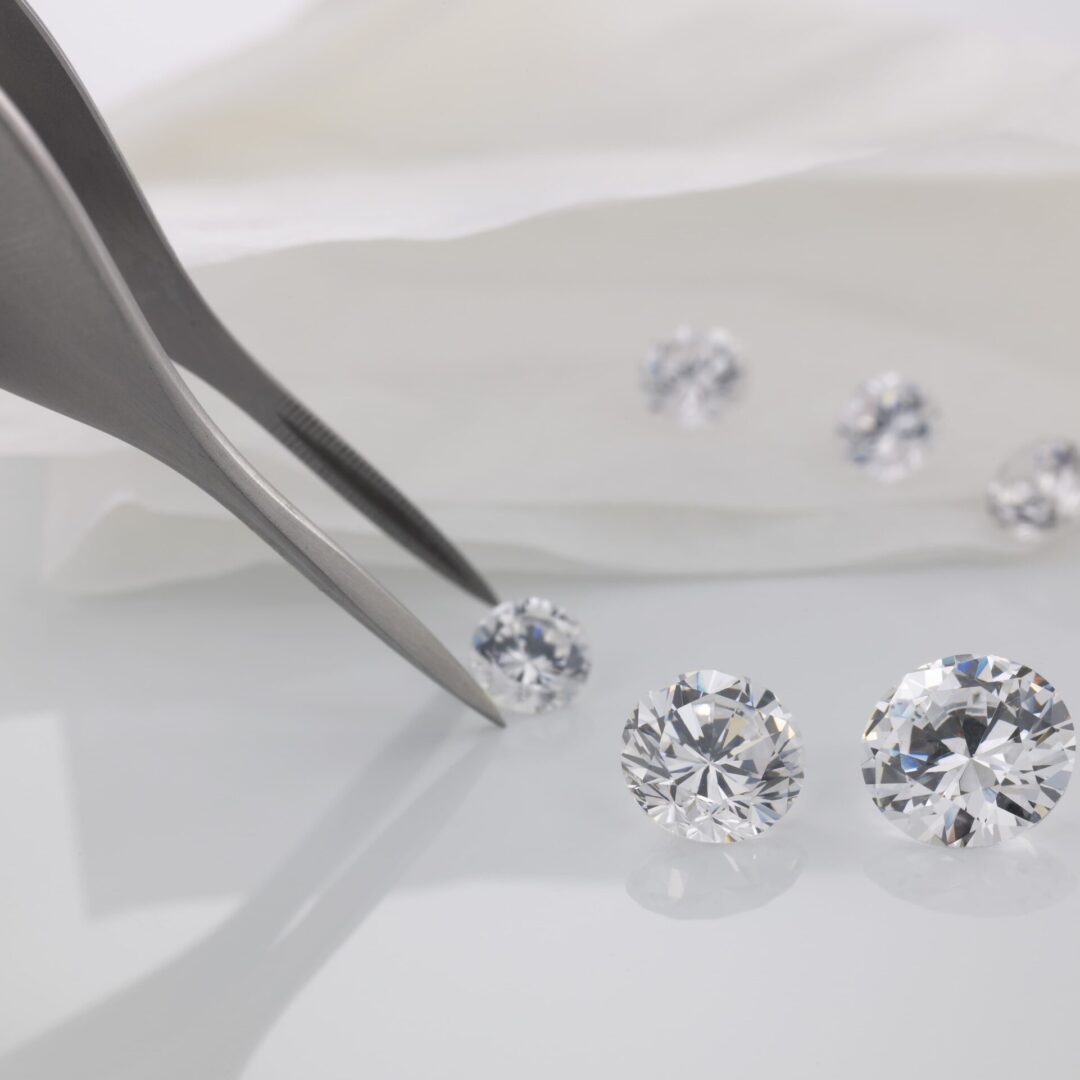 tweezers-and-cut-diamonds-2022-12-16-22-33-55-utc